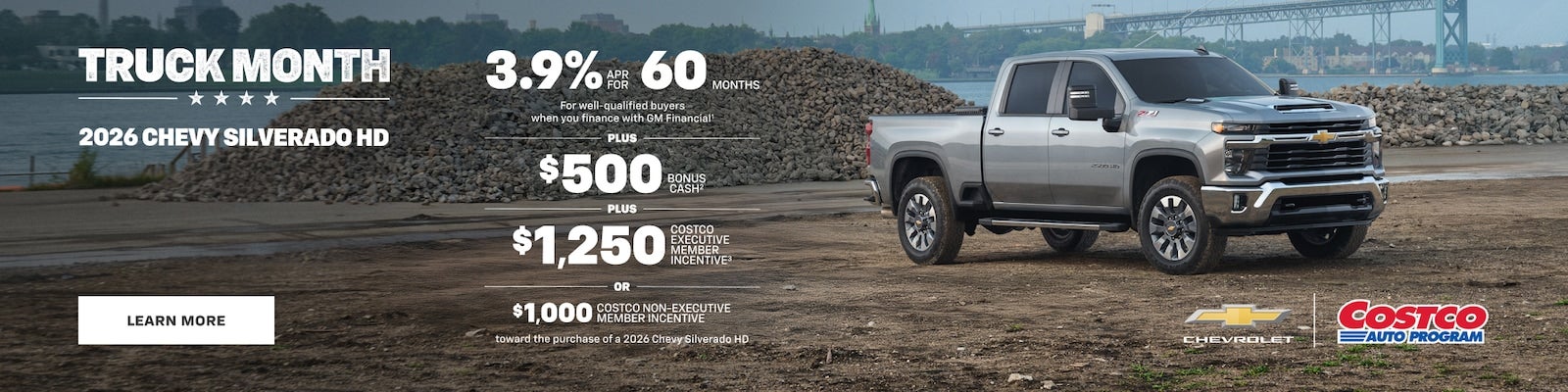 Silverado HD parked near gravel with Truck Month and Costco program details
